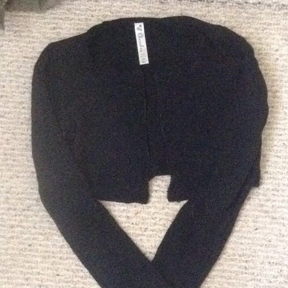 A black long sleeved cover up for girls